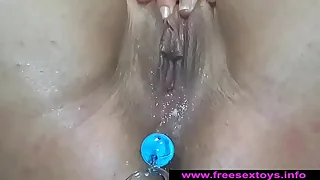 amateur-milf-squirting-fucking-a-banana-with-anal-beads