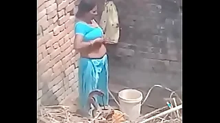 My Neighbour aunty Bathing resembling her beamy boobs.